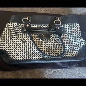 Great condition, leather coach handbag with duster bag